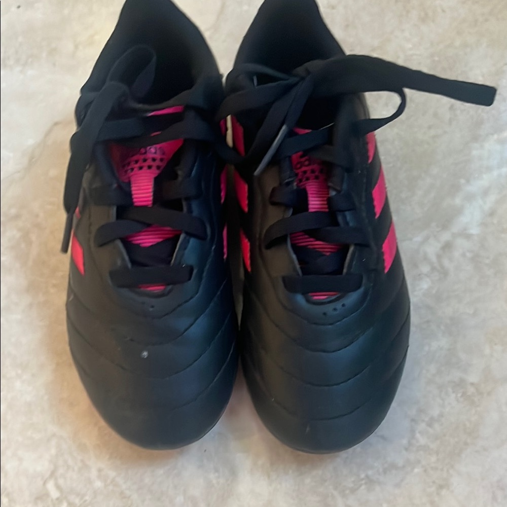 Adidas Black and Pink Girls soccer cleats.